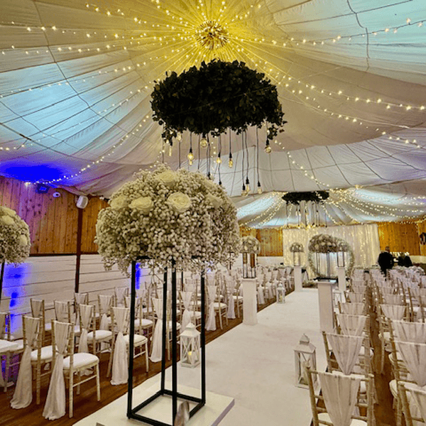 The barn at The Wellbeing Farm set up for a wedding ceremony